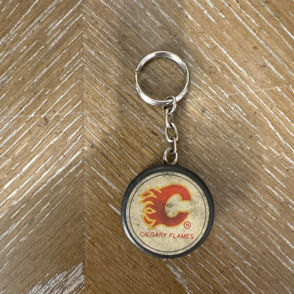Calgary Flames Hockey Puck Keychain.